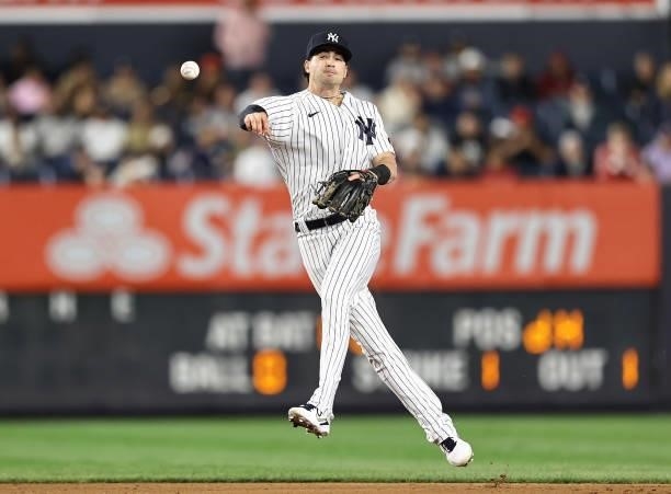 Tyler Wade of the New York Yankees fields a hit by Jarrod Dyson of the Kansas City Royals in the eighth inning at Yankee Stadium on June 22, 2021 in...