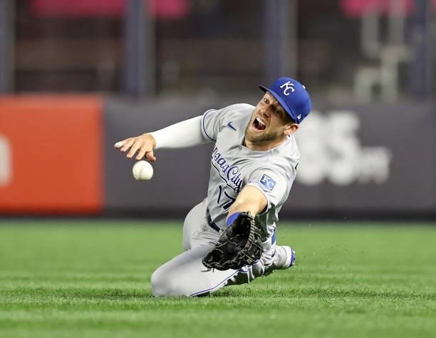 Hunter Dozier of the Kansas City Royals chases after a hit by Gio Urshela of the New York Yankees in the ninth inning at Yankee Stadium on June 22,...
