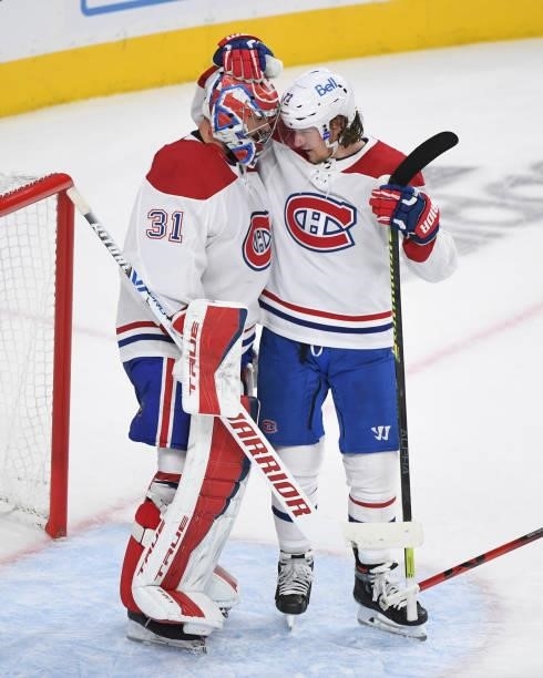 Tyler Toffoli of the Montreal Canadiens congratulates teammate Carey Price after defeating the Vegas Golden Knights in Game Five of the Stanley Cup...