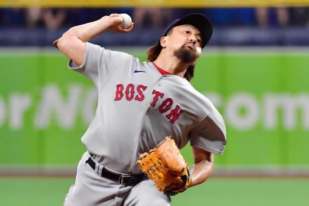 Hirokazu Sawamura of the Boston Red Sox delivers a pitch against the Tampa Bay Rays in the ninth inning at Tropicana Field on June 22, 2021 in St...