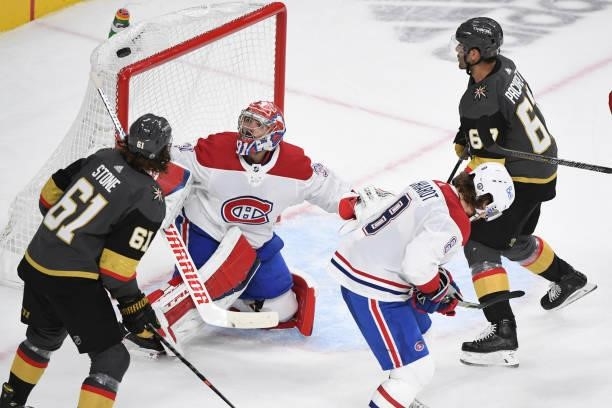 Carey Price of the Montreal Canadiens watches as a shot by Max Pacioretty of the Vegas Golden Knights sails over the net during the third period in...