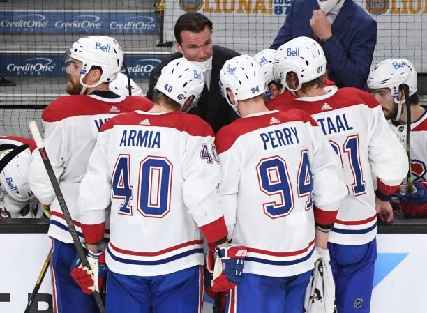 Assistant coach Luke Richardson of the Montreal Canadiens talks to his players during a break in the action against the Vegas Golden Knights during...