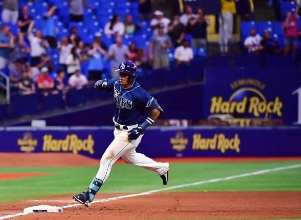 Wander Franco of the Tampa Bay Rays rounds third base after hitting a three-run home run in the fifth inning against the Boston Red Sox during his...