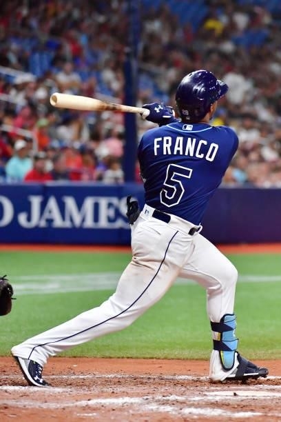 Wander Franco of the Tampa Bay Rays hits a three-run home run in the fifth inning against the Boston Red Sox during his Major League debut at...