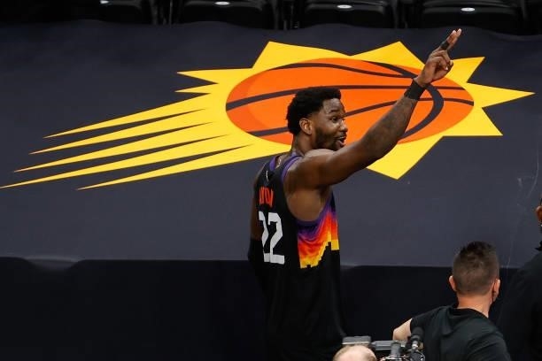 Deandre Ayton of the Phoenix Suns reacts to fans as he exits game two of the Western Conference Finals against the LA Clippers at Phoenix Suns Arena...