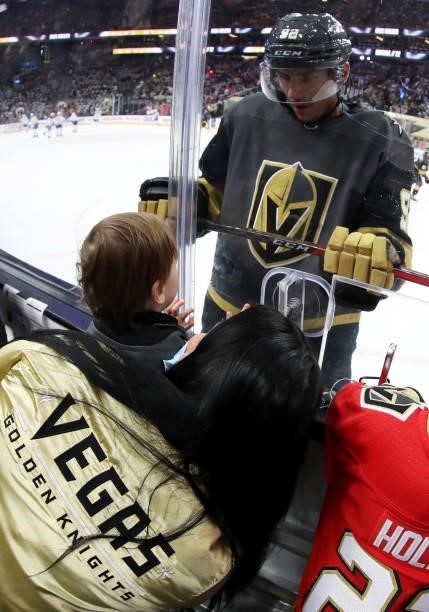 Tomas Nosek of the Vegas Golden Knights greets his son Patrik Nosek and wife Eliska Noskova during warmups before Game Five of the Stanley Cup...