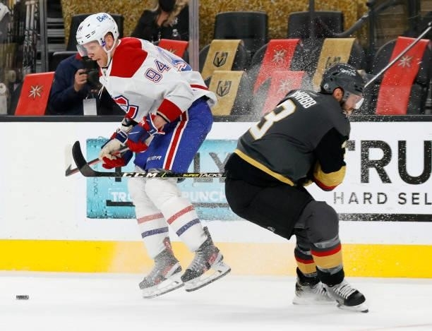 Corey Perry of the Montreal Canadiens skates with the puck against Brayden McNabb of the Vegas Golden Knights in the third period in Game Five of the...