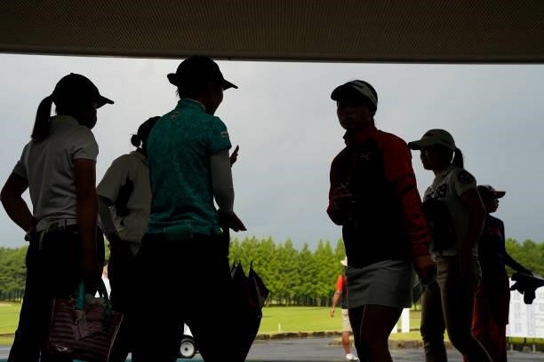 Players are seen at the club house as the play has been suspended due to bad weather during the second round of the JLPGA Pro Test at Shizu Hills...
