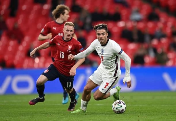 Jack Grealish of England runs with the ball whilst under pressure from Petr Sevcik of Czech Republic during the UEFA Euro 2020 Championship Group D...