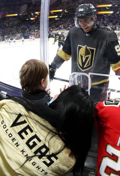 Tomas Nosek of the Vegas Golden Knights greets his son Patrik Nosek and wife Eliska Noskova during warmups before Game Five of the Stanley Cup...