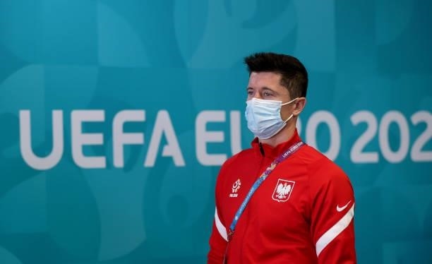 Robert Lewandowski of Poland is seen wearing a face mask as he arrives at the stadium prior to the UEFA Euro 2020 Championship Group E match between...