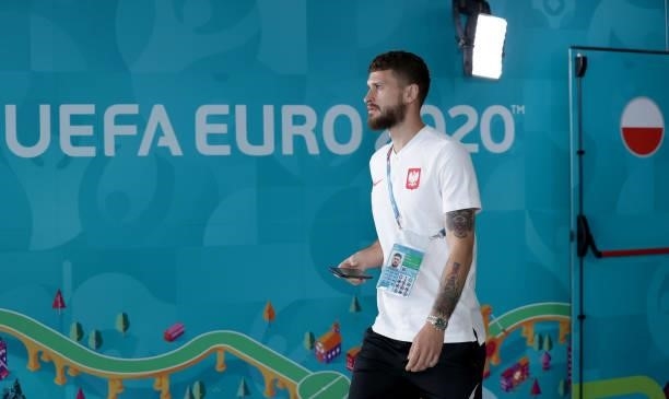Mateusz Klich of Poland walks out to inspect the pitch prior to the UEFA Euro 2020 Championship Group E match between Sweden and Poland at Saint...