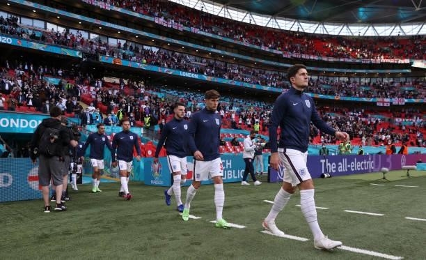 Harry Maguire, John Stones, Declan Rice and Kalvin Phillips of England walk out on to the pitch prior to the UEFA Euro 2020 Championship Group D...