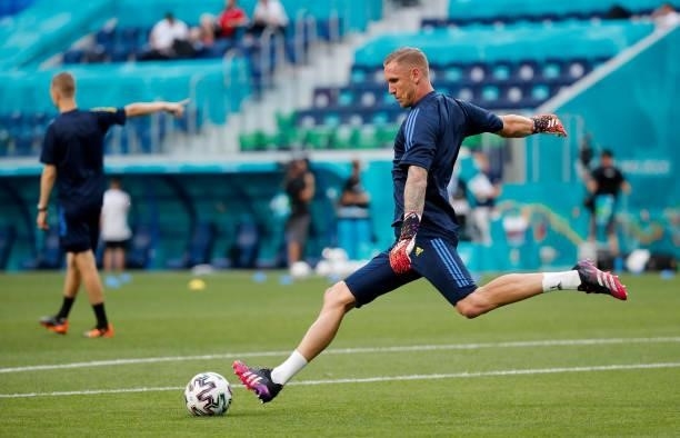 Robin Olsen of Sweden warms up prior to the UEFA Euro 2020 Championship Group E match between Sweden and Poland at Saint Petersburg Stadium on June...
