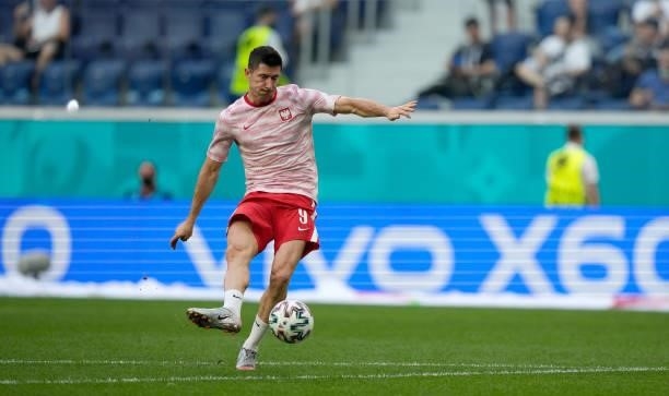 Robert Lewandowski of Poland shoots during the warm up prior to the UEFA Euro 2020 Championship Group E match between Sweden and Poland at Saint...