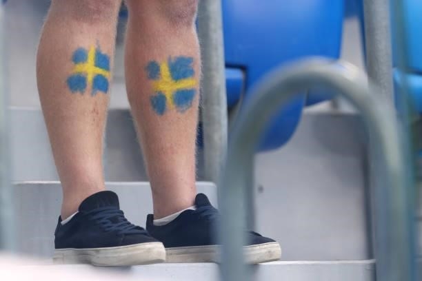Sweden fan is seen with face paint on their legs inside the stadium prior to the UEFA Euro 2020 Championship Group E match between Sweden and Poland...