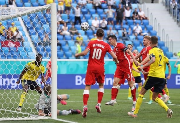 Robert Lewandowski of Poland hits the crossbar from a header during the UEFA Euro 2020 Championship Group E match between Sweden and Poland at Saint...