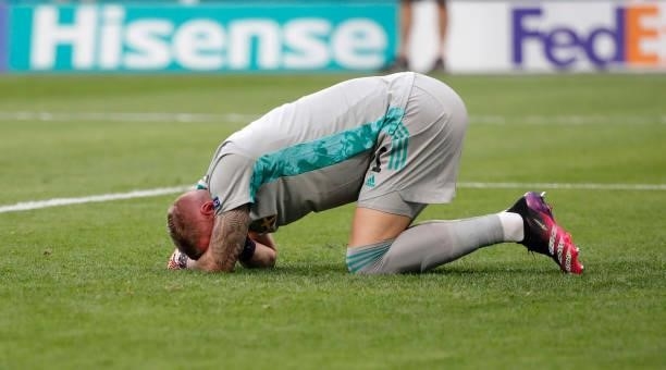 Robin Olsen of Sweden goes down as he appears to be injured during the UEFA Euro 2020 Championship Group E match between Sweden and Poland at Saint...