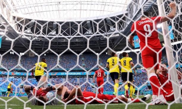 Robert Lewandowski of Poland reacts after missing a chance during the UEFA Euro 2020 Championship Group E match between Sweden and Poland at Saint...
