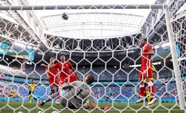Robert Lewandowski of Poland hits the crossbar from a header during the UEFA Euro 2020 Championship Group E match between Sweden and Poland at Saint...