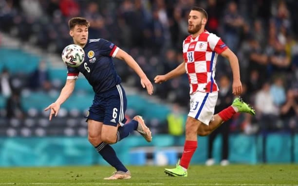 Croatia's midfielder Nikola Vlasic challenges Scotland defender Kieran Tierney during the UEFA Euro 2020 Championship Group D match between Croatia...