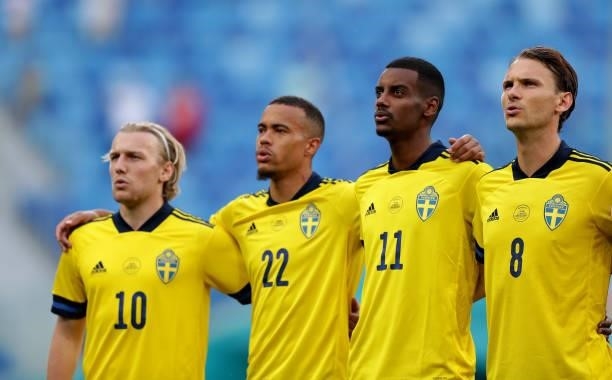 Emil Forsberg, Robin Quaison, Alexander Isak and Albin Ekdal of Sweden stand for the national anthem prior to the UEFA Euro 2020 Championship Group E...
