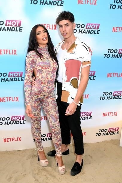 Emily Miller and Cam Holmes attend the "Too Hot To Handle