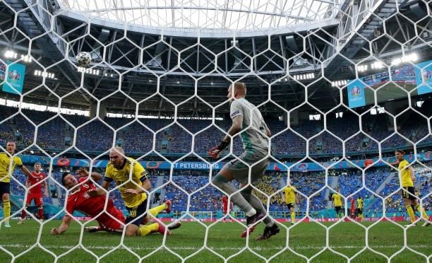 Robert Lewandowski of Poland collides with Marcus Danielson of Sweden during the UEFA Euro 2020 Championship Group E match between Sweden and Poland...