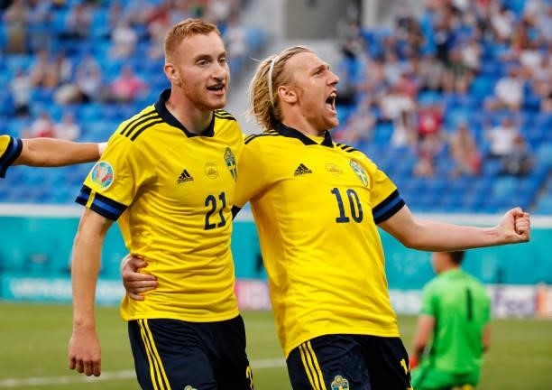 Emil Forsberg celebrates with teammate Dejan Kulusevski after scoring their side's second goal during the UEFA Euro 2020 Championship Group E match...