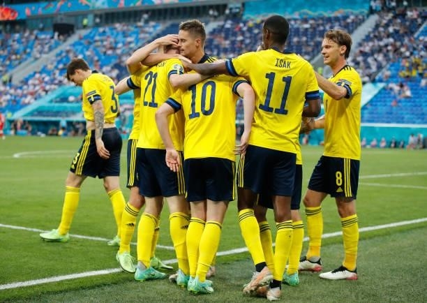 Emil Forsberg celebrates with teammates after scoring their side's second goal during the UEFA Euro 2020 Championship Group E match between Sweden...