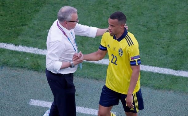 Robin Quaison of Sweden shakes hands with Jan Andersson, Head Coach of Sweden after being substituted during the UEFA Euro 2020 Championship Group E...