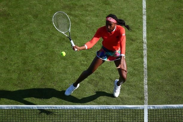 Cori Gauff of USA in action during her first round women's doubles match with Jelena Ostapenko of Latvia against Heather Watson and Harriet Dart of...