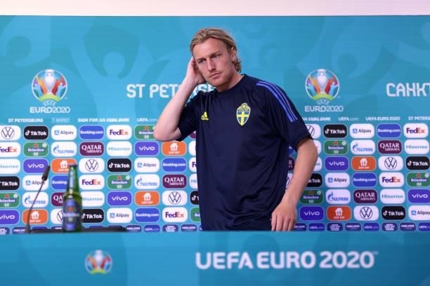 In this handout picture provided by UEFA, Emil Forsberg of Sweden prepares to speak to the media during the Sweden Press Conference after the UEFA...