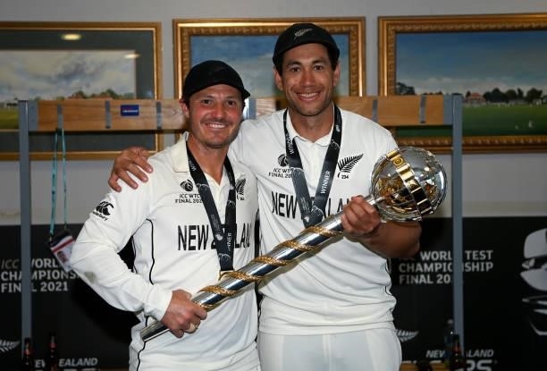 Watling and Ross Taylor of New Zealand celebrate winning in the dressing rooms after winning the ICC World Test Championship Final between India and...