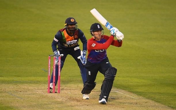 Jason Roy of England plays a shot as Kusal Perera of Sri Lanka looks on during the T20 International Series First T20I match between England and Sri...