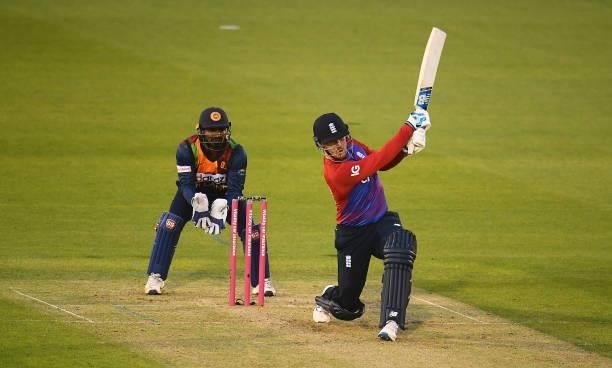 Jason Roy of England plays a shot as Kusal Perera of Sri Lanka looks on during the T20 International Series First T20I match between England and Sri...