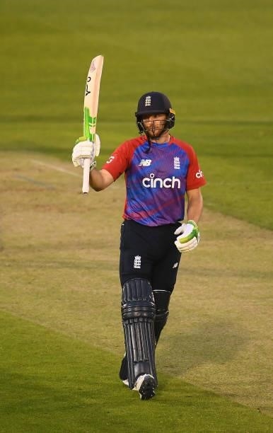 Jos Buttler of England celebrates after reaching their half century during the T20 International Series First T20I match between England and Sri...
