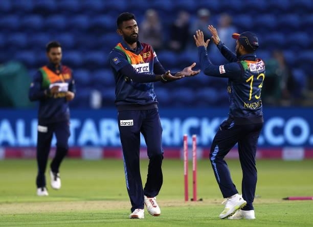 Isuru Udana of Sri Lanka celebrates bowling out Dawid Malan of England during the T20 International Series first T20I match between England and Sri...
