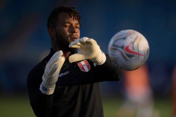 Pedro Gallese goalkeeper of Peru warms up prior to a Group B match between Ecuador and Peru as part of Copa America Brazil 2021 at Estadio Olimpico...