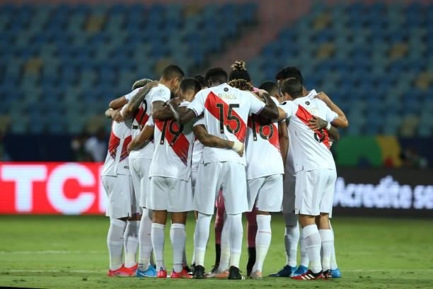 Players of Peru huddle prior to a Group B match between Ecuador and Peru as part of Copa America Brazil 2021 at Estadio Olimpico on June 23, 2021 in...