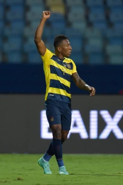 Pervis Estupiñan of Ecuador celebrates the first goal of his team scored by an own goal of Renato Tapia of Peru during a Group B match between...