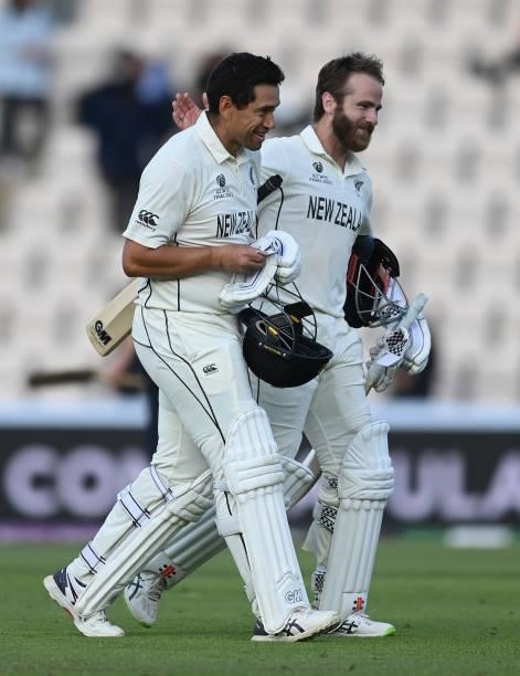 Ross Taylor and Kane Williamson leave the field after New Zealand won the ICC World Test Championship Final against India at The Hampshire Bowl on...