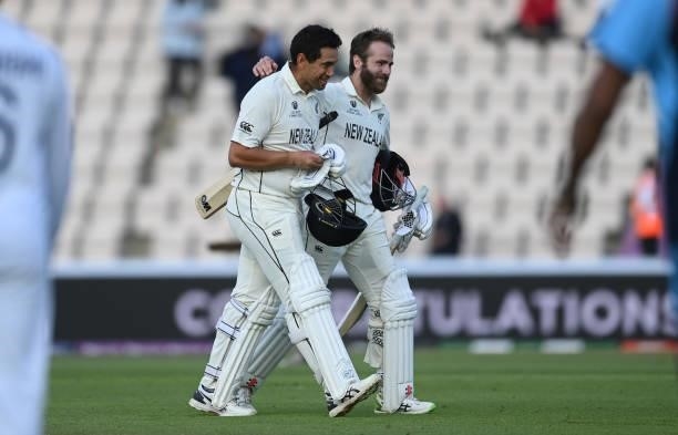 Ross Taylor and Kane Williamson leave the field after New Zealand won the ICC World Test Championship Final against India at The Hampshire Bowl on...
