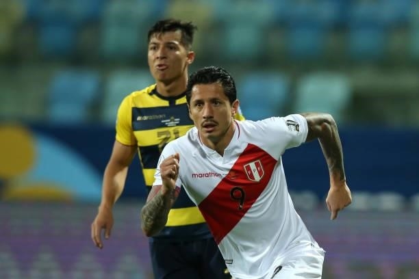 Gianluca Lapadula of Peru reacts after scoring the first goal of his team during a Group B match between Ecuador and Peru as part of Copa America...