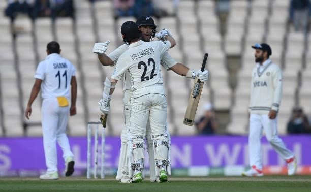 Ross Taylor embraces Kane Williamson of New Zealand after the winning runs as New Zealand won the ICC World Test Championship Final between India and...