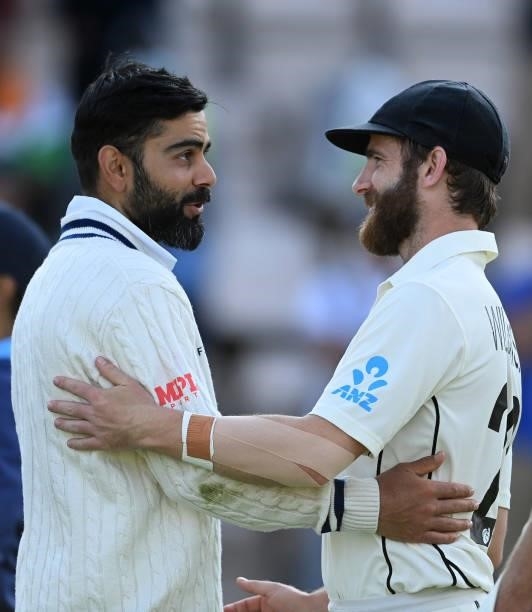 Virat Kohli of India and Kane Williamson of New Zealand talk after the ICC World Test Championship Final against India at The Hampshire Bowl on June...