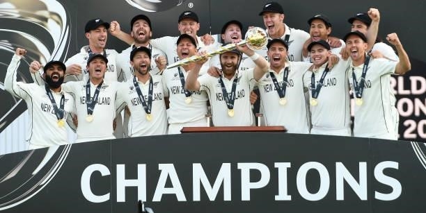 Kane Williamson, captain of of New Zealand holds the Test mace with team mates after the ICC World Test Championship Final against India at The...