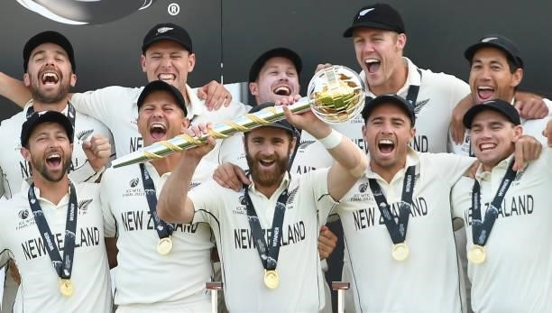 Kane Williamson, captain of of New Zealand holds the Test mace with team mates after the ICC World Test Championship Final against India at The...