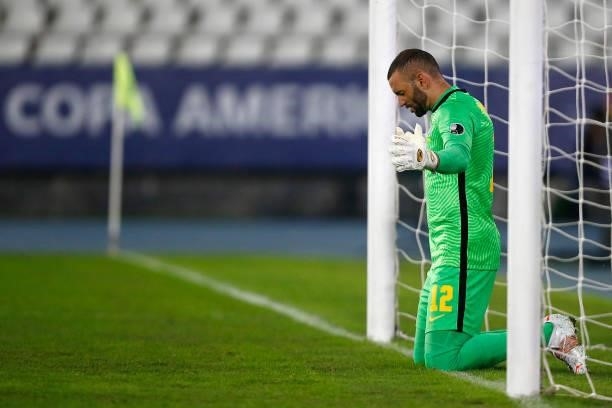 Weverton of Brazil prays prior to the second half during a Group B match between Brazil and Colombia as part of Copa America Brazil 2021 at Estadio...