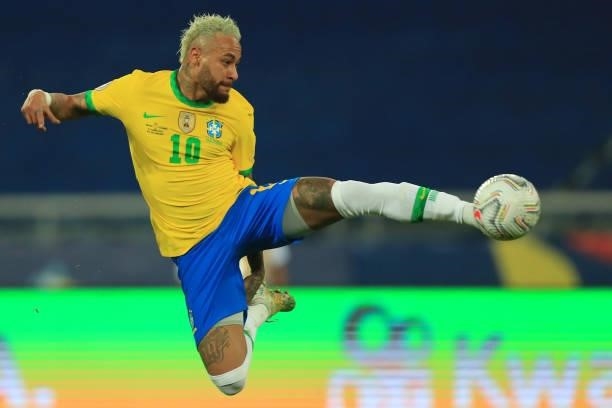 Neymar Jr. Of Brazil kicks the ball in he air during a Group B match between Brazil and Colombia as part of Copa America Brazil 2021 at Estadio...